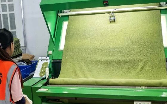 Fabric inspection machine at our Cambodia factory